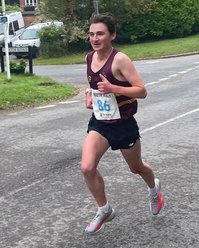 This photo is of Matthew Quartermain. It was taken by Frieth Hilly 10K